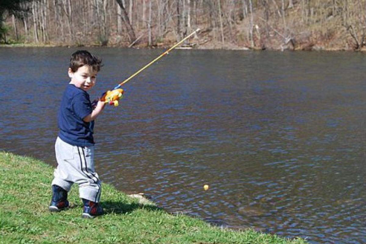 My 2 yr old Son Garrett fishing at the pond behind Oxford Town Hall.